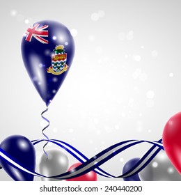 Flag of the Cayman Islands on balloon. Celebration and gifts. Ribbon in the colors are twisted Balloons on the feast of the national day. 