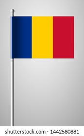 Flag of Chad. National Flag on Flagpole. Isolated Illustration on Gray Background