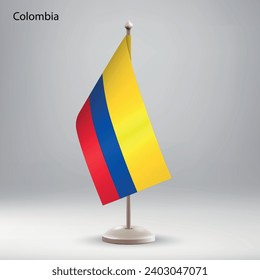 Flag of Colombia hanging on a flag stand. Usable for summit or conference presentaiton