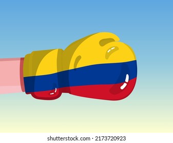 Flag of Colombia on boxing glove. Confrontation between countries with competitive power. Offensive attitude. Separation of power. Template ready design.