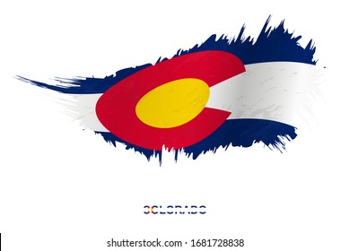 Flag of Colorado state in grunge style with waving effect, vector grunge brush stroke flag.