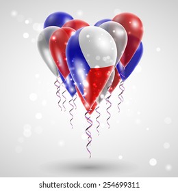 Flag of the Czech Republic on air balls in heart-shaped. Celebration and gifts. Ribbon in  colors are twisted under the balloon. Independence Day. Balloons on the feast of the national
