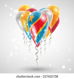 Flag of Democratic Republic of Congo on air balls in heart-shaped. Celebration and gifts. Ribbon in  colors twisted under balloon. Independence Day. Balloons on the feast of national