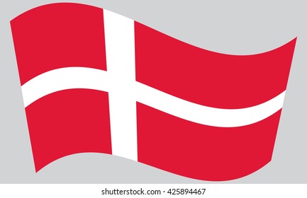 Flag of Denmark waving on gray background