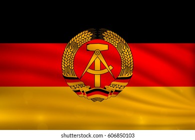 flag of East Germany on wavy silk background with bokeh lights. Realistic vector illustration.