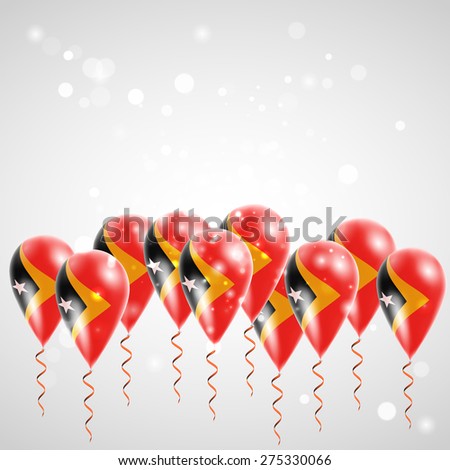Flag of East Timor on balloon. Celebration and gifts. Balloons on the feast of the national day. 
