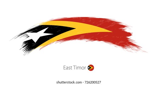 Flag of East Timor in rounded grunge brush stroke. Vector illustration.