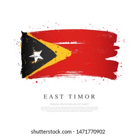 Flag of East Timor. Vector illustration on a white background. Brush strokes are drawn by hand. Independence Day.