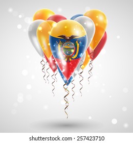 Flag of Ecuador on air balls in heart-shaped. Celebration and gifts. Ribbon in the colors are twisted under the balloon. Independence Day. Balloons on feast of the national