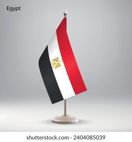 Flag of Egypt hanging on a flag stand. Usable for summit or conference presentaiton