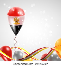 Flag of Egypt on balloon. Celebration and gifts. Ribbon in the colors are twisted. Balloons on the feast of the national day. 