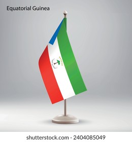 Bandera de Guinea Ecuatorial colgando en un puesto de bandera. Utilizable para la presentación en la cumbre o en la conferencia