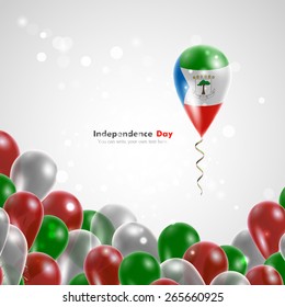 Flag of Equatorial Guinea on balloon. Celebration and gifts. Ribbon in the colors are twisted. Independence Day. Balloons on the feast of the national