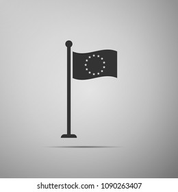 Flag of European Union icon isolated on grey background. EU circle symbol. Waving EU flag on a metallic pole. Flat design. Vector Illustration