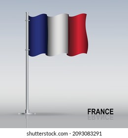 Bandera de Francia ondeando sobre un asta de bandera sobre la mesa. Ilustración del vector