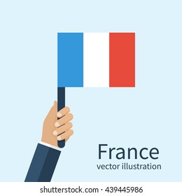 Flag of France a man holding in hands. Independence Day of the Bastille July 14. Vector illustration of a flat design. Isolated French flag in hands.