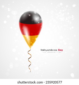 Flag of Germany. Celebration and gifts. Ribbon in the colors are twisted under the balloon. Independence Day. Balloons on the feast of the national