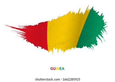 Flag of Guinea in grunge style with waving effect, vector grunge brush stroke flag.