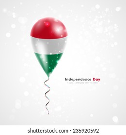 Flag of Hungary. Celebration and gifts. Ribbon in the colors are twisted under the balloon. Independence Day. Balloons on the feast of the national