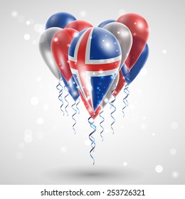 Flag of Iceland on air balls in heart-shaped. Celebration and gifts. Ribbon in the colors are twisted under the balloon. Independence Day. Balloons on the feast of the national
