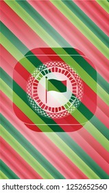 flag icon inside christmas colors badge.
