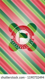 flag icon inside christmas style emblem.