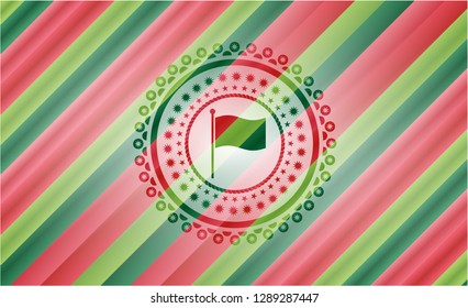 flag icon inside christmas style badge..
