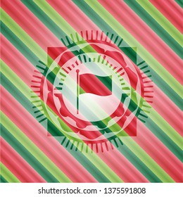 flag icon inside christmas style badge..