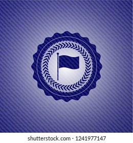 flag icon inside emblem with jean background