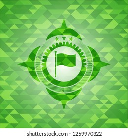 flag icon inside green emblem with triangle mosaic background