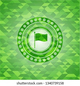 flag icon inside green mosaic emblem