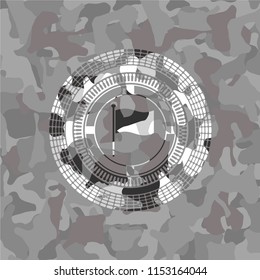 flag icon inside grey camouflaged emblem