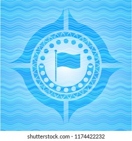 flag icon inside light blue water wave emblem.