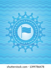 flag icon inside light blue water wave emblem.