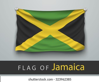 FLAG OF jamaica battered, hung on the wall