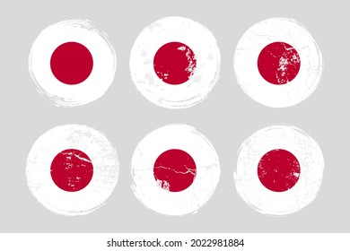 Flag of Japan grunge textures set. National flag of Japan. Grungy effect templates collection for greetings cards, posters, celebrate banners and flyers. Vector illustration.