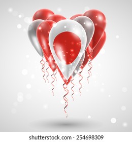Flag of Japan on air balls in heart-shaped. Celebration and gifts. Ribbon in the colors are twisted under the balloon. Independence Day. Balloons on the feast of the national