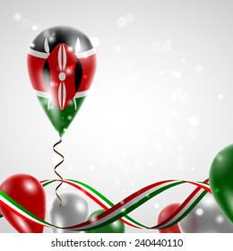 Flag of Kenya on balloon. Celebration and gifts. Ribbon in the colors are twisted. Balloons on the feast of the national day. 