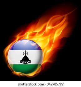 Flag of Lesotho as round glossy icon burning in flame