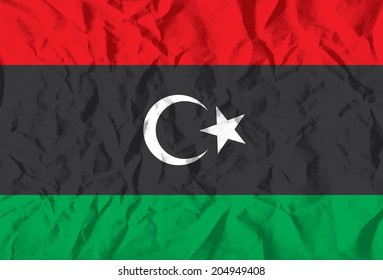 Flag of Libya on wrinkled paper vector illustration.