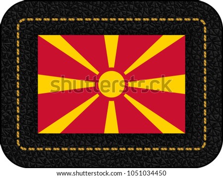 Flag of Macedonia. Vector Icon on Black Leather Backdrop. Aspect Ratio 2:3