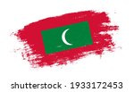 Flag of Maldives country on brush paint stroke trail view. Elegant texture of national country flag