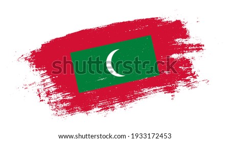 Flag of Maldives country on brush paint stroke trail view. Elegant texture of national country flag