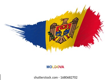 Flag of Moldova in grunge style with waving effect, vector grunge brush stroke flag.