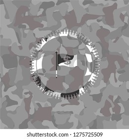 flag with money symbol inside icon inside grey camouflaged emblem
