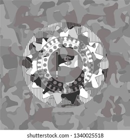 flag with money symbol inside icon inside grey camouflage texture