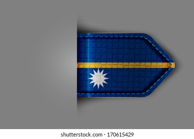 Flag of Nauru in the form of a glossy textured label or bookmark. Vector illustration.