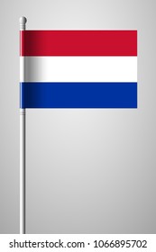 Flag of Netherlands. National Flag on Flagpole. Isolated Illustration on Gray Background