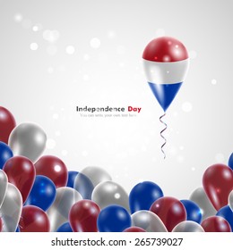 Flag of the Netherlands on balloon. Celebration and gifts. Ribbon in the colors are twisted. Independence Day. Balloons on the feast of the national