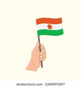 Flag of Niger, Hand Holding flag